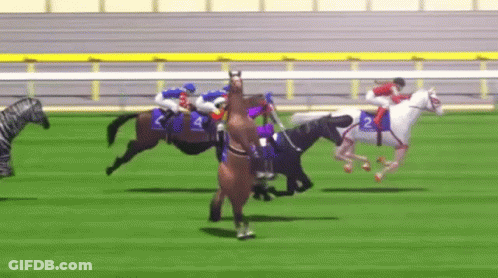 A Group Of Horses Are Racing On A Track And One Of The Horses Has The Number 2 On It GIF