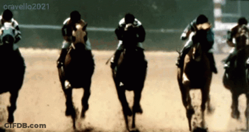 A Group Of Horses Are Racing On A Track And The Year 2021 Is Visible GIF