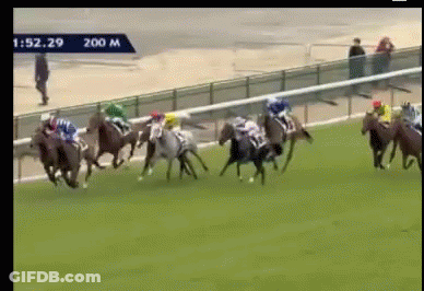 A Group Of Horses Are Racing On A Track With The Time Of 1:52.29 GIF