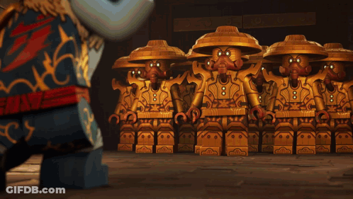 A Group Of Lego Figures Are Standing In A Line GIF
