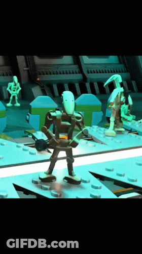 A Group Of Lego Figures Standing On Top Of A Table In A Room GIF