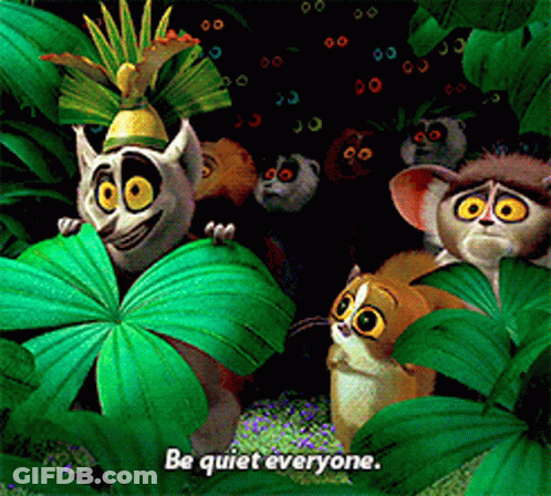 A Group Of Lemurs Are Standing In A Jungle With The Words Be Quiet Everyone Written Below Them GIF
