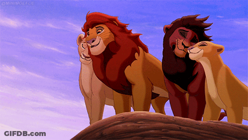 A Group Of Lions From The Lion King Standing On Top Of A Hill GIF