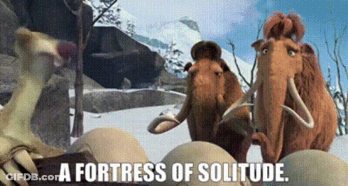 A Group Of Mammoths Standing Next To Each Other With The Words A Fortress Of Solitude Written Below Them . GIF