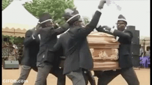A Group Of Men Are Carrying A Coffin And Dancing . GIF