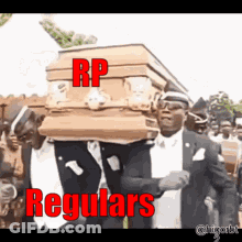 A Group Of Men Are Carrying A Coffin That Says Regulars GIF
