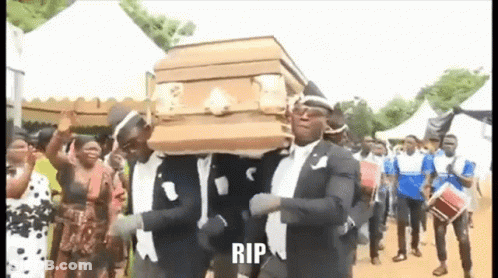 A Group Of Men Are Carrying A Coffin With The Word Rip On It . GIF