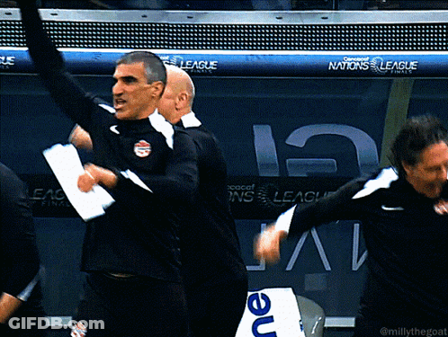 A Group Of Men Are Dancing In Front Of A Banner For The Nations League GIF