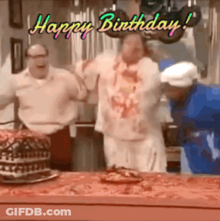 A Group Of Men Are Dancing In Front Of A Birthday Cake With The Words Happy Birthday Written Above Them GIF