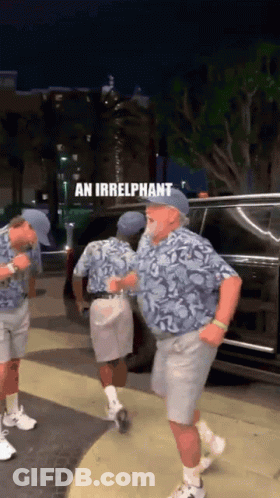 A Group Of Men Are Dancing In Front Of A Car And The Caption Reads " An Irrelevant " GIF