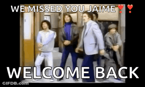 A Group Of Men Are Dancing In Front Of A Door With The Words Welcome Back On The Bottom GIF