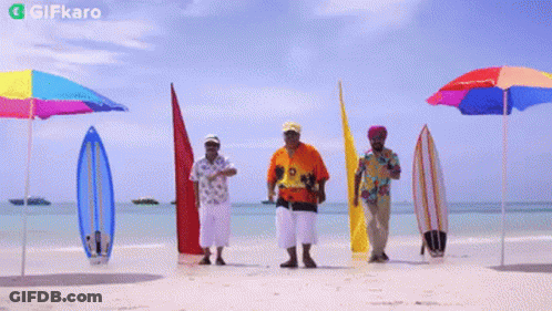 A Group Of Men Are Dancing On A Beach With Surfboards And Umbrellas And A Gifkaro Logo In The Corner GIF