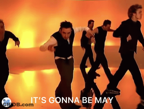 A Group Of Men Are Dancing With The Words It 'S Gonna Be May GIF