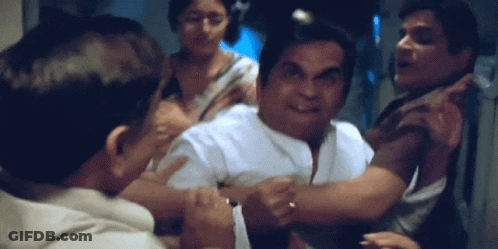 A Group Of Men Are Having A Fight And One Of Them Is Wearing A Ring GIF