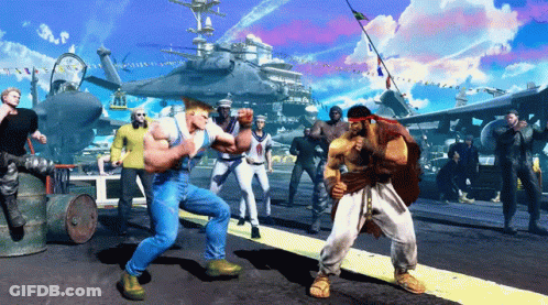 A Group Of Men Are Playing A Video Game In Front Of A Large Military Ship GIF