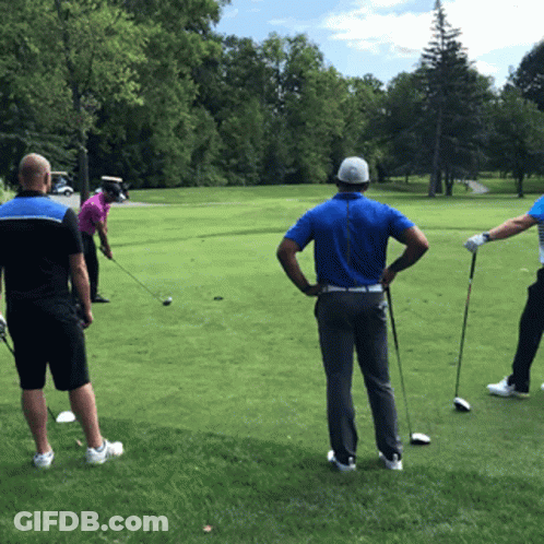 A Group Of Men Are Playing Golf And One Of Them Is Wearing A Blue Shirt GIF