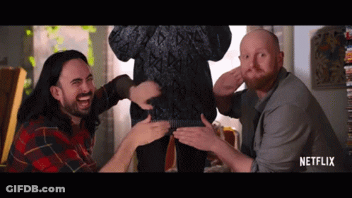 Men Playing With Woman's Sweater In Netflix Ad GIF