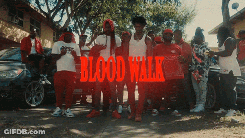 A Group Of Men Are Posing For A Picture With The Words Blood Walk Written In Red GIF