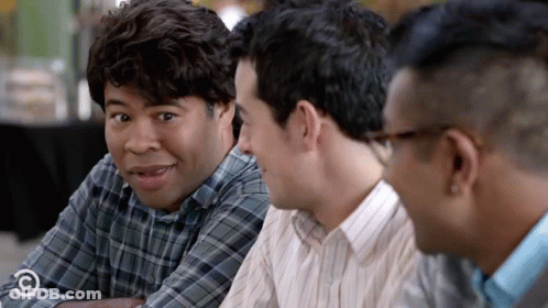 A Group Of Men Are Sitting At A Table With A Copyright Symbol On The Bottom Right GIF