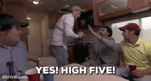 A Group Of Men Are Sitting In A Camper Van And One Of Them Is Giving A High Five . GIF