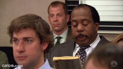 A Group Of Men Are Sitting In A Room With A Nbc Logo On The Bottom Right GIF