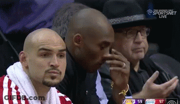 A Group Of Men Are Sitting In A Stadium Watching A Basketball Game On Sportsnet Live GIF