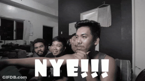 A Group Of Men Are Sitting On A Couch And One Of Them Is Pointing At The Word Nye GIF