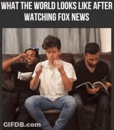 A Group Of Men Are Sitting On A Couch Watching Fox News .. GIF