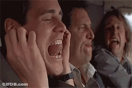 A Group Of Men Are Sitting On A Plane And One Of Them Is Screaming . GIF