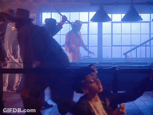 Men Around Pool Table With Thriller Glitter GIF
