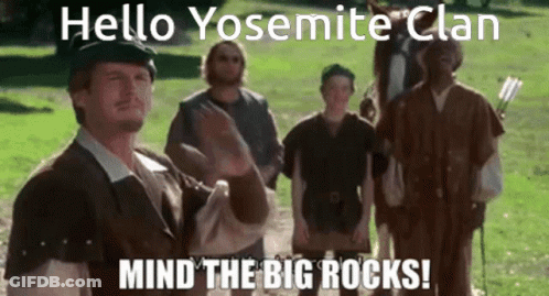 A Group Of Men Are Standing In A Grassy Field And One Of Them Is Saying Hello Yosemite Clan Mind The Big Rocks GIF