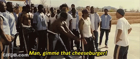 A Group Of Men Are Standing In A Line And One Of Them Says Man Gimme That Cheeseburger . GIF