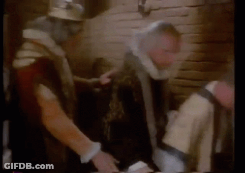 A Group Of Men Are Standing In A Room With Smoke Coming Out Of The Ceiling . GIF