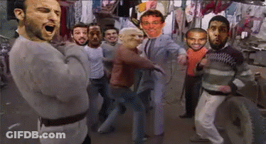 A Group Of Men Are Standing In A Room With Their Faces On The Wall GIF