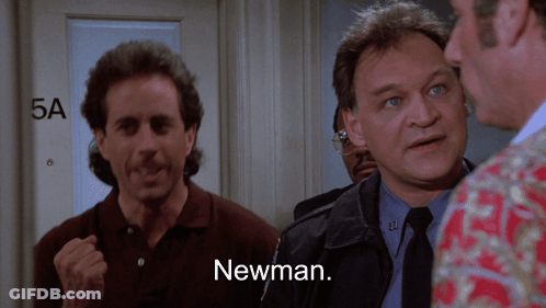 A Group Of Men Are Standing In Front Of A Door That Says 5A GIF