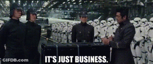 A Group Of Men Are Standing In Front Of A Row Of Stormtroopers And Talking To Each Other . GIF