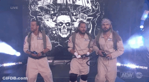 A Group Of Men Are Standing In Front Of A Screen That Says Live GIF