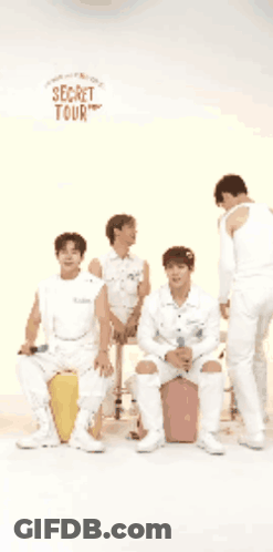 A Group Of Men Are Standing In Front Of A Sign That Says Secret Tour You Got A Clip GIF