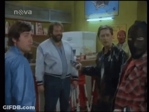 A Group Of Men Are Standing In Front Of A Tv Screen That Says Nova On It GIF