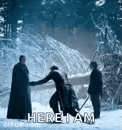 A Group Of Men Are Standing In The Snow And One Of Them Is Holding A Sword And Says `` Here I Am '' . GIF