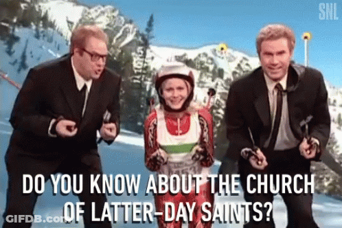 A Group Of Men Are Standing Next To A Woman In A Ski Suit And Asking Her About The Church Of Latter-Day Saints GIF