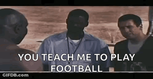 A Group Of Men Are Standing Next To Each Other And One Of Them Is Talking To The Other . GIF