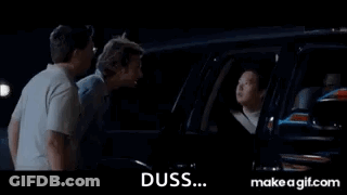 A Group Of Men Are Standing Next To Each Other In A Car At Night . GIF