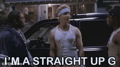 A Group Of Men Are Standing Next To Each Other In Front Of A Car And Talking . GIF
