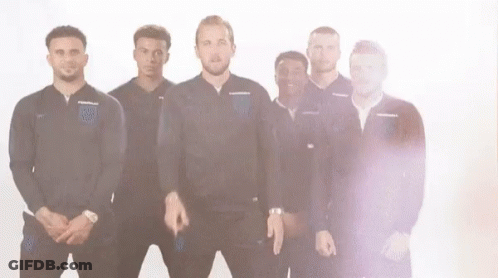 A Group Of Men Are Standing Next To Each Other On A White Background And Making Funny Faces . GIF