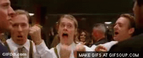 A Group Of Men Are Standing Next To Each Other With Their Mouths Open In A Crowd . GIF