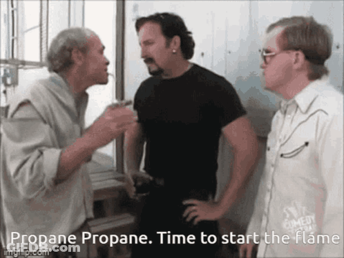 A Group Of Men Are Talking About Propane Propane GIF