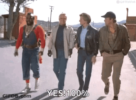 A Group Of Men Are Walking Down A Street And One Of Them Is Holding A Bottle Of Water . GIF