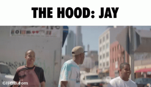 A Group Of Men Are Walking Down A Street With The Words " The Hood Jay " Above Them GIF