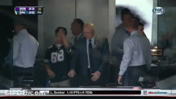 A Group Of Men Are Watching A Football Game On A Fox Channel GIF